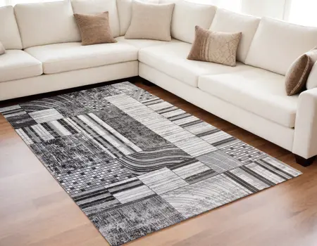 5' X 8' Gray Brown and Beige Abstract Area Rug