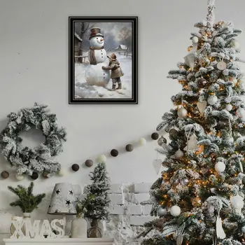 Boy Building A Snowman Black Framed Wall Art