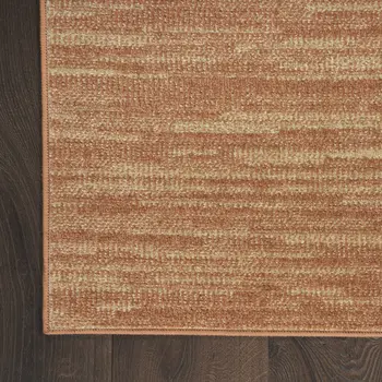 2' X 4' Rust And Beige Abstract Indoor Outdoor Area Rug