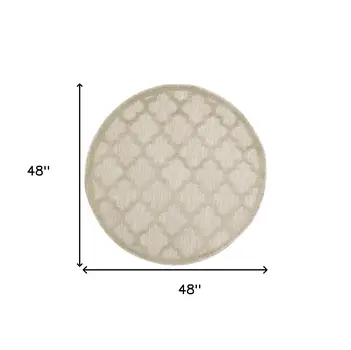 4' Cream And Beige Round Geometric Indoor Outdoor Area Rug