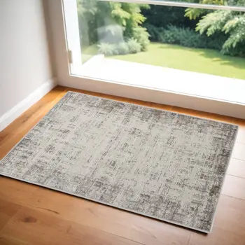 2' X 3' Ivory and Gray Abstract Area Rug