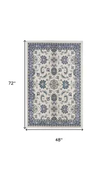 4' X 6' Ivory And Blue Floral Indoor Outdoor Area Rug