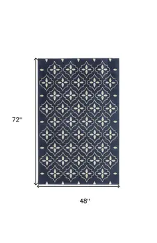 4' X 6' Navy Blue And Ivory Geometric Indoor Outdoor Area Rug