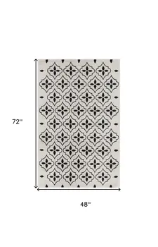 4' X 6' Ivory And Black Geometric Indoor Outdoor Area Rug