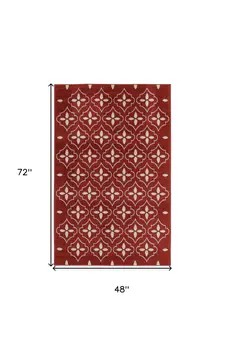 4' X 6' Brick Red And Ivory Geometric Indoor Outdoor Area Rug
