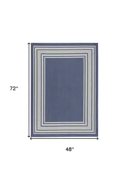 4' X 6' Navy Blue And Ivory Geometric Indoor Outdoor Area Rug