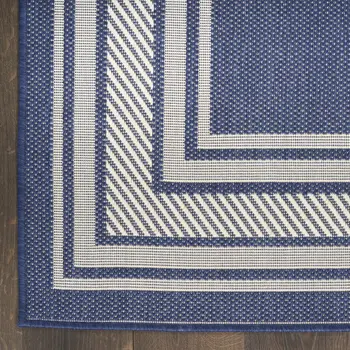 4' X 6' Navy Blue And Ivory Geometric Indoor Outdoor Area Rug