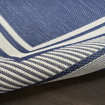 4' X 6' Navy Blue And Ivory Geometric Indoor Outdoor Area Rug