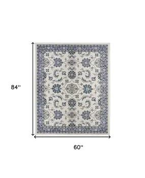 5' X 7' Ivory And Blue Floral Indoor Outdoor Area Rug