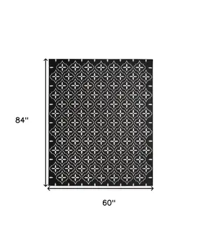 5' X 7' Black And Ivory Geometric Indoor Outdoor Area Rug