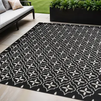 5' X 7' Black And Ivory Geometric Indoor Outdoor Area Rug