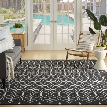5' X 7' Black And Ivory Geometric Indoor Outdoor Area Rug