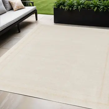 5' X 7' Ivory And Gold Indoor Outdoor Area Rug