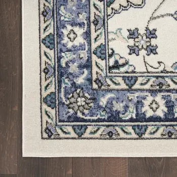 6' X 9' Ivory And Blue Floral Indoor Outdoor Area Rug