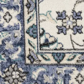 6' X 9' Ivory And Blue Floral Indoor Outdoor Area Rug