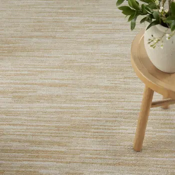 6' X 9' Ivory And Gold Abstract Indoor Outdoor Area Rug