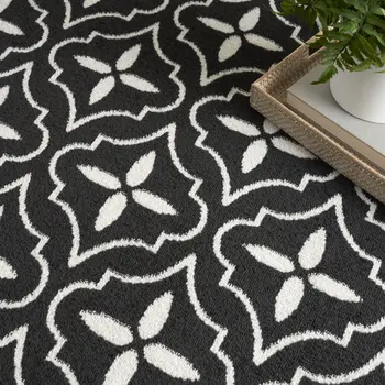 6' X 9' Black And Ivory Geometric Indoor Outdoor Area Rug