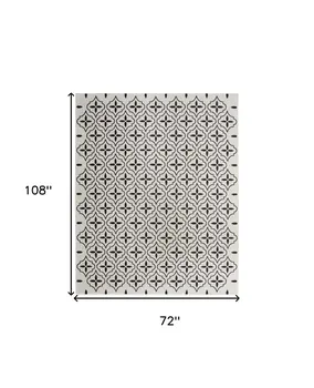 6' X 9' Ivory And Black Geometric Indoor Outdoor Area Rug