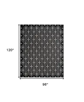 8' X 10' Black And Ivory Geometric Indoor Outdoor Area Rug