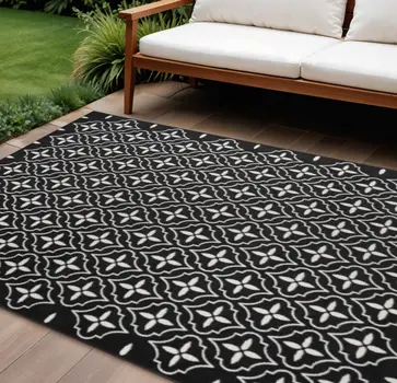 8' X 10' Black And Ivory Geometric Indoor Outdoor Area Rug