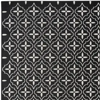 8' X 10' Black And Ivory Geometric Indoor Outdoor Area Rug