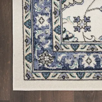 9' X 12' Ivory And Blue Floral Indoor Outdoor Area Rug