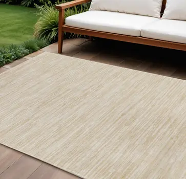 9' X 12' Ivory And Gold Abstract Indoor Outdoor Area Rug