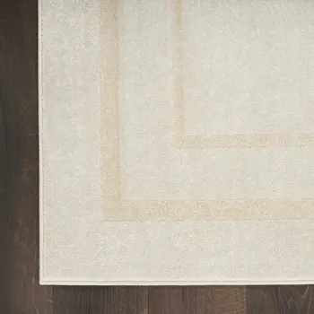 9' X 12' Ivory And Gold Indoor Outdoor Area Rug