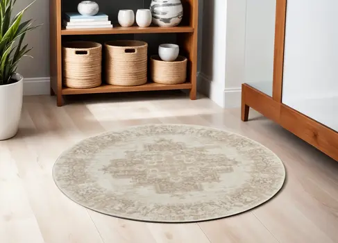 4' Ivory Floral Power Loom Worn Faded Round Rug