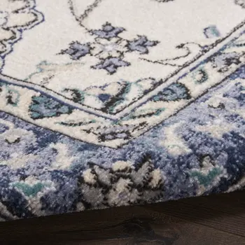 4' Ivory And Blue Round Floral Indoor Outdoor Area Rug