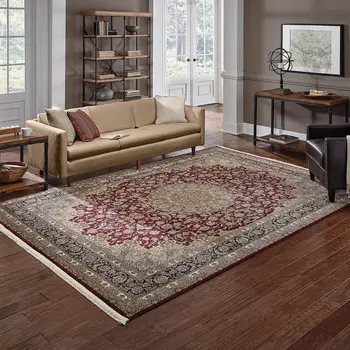 4' X 5' Ivory Red And Orange Medallion Area Rug With Fringe