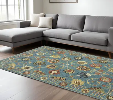 10' X 13' Blue Yellow And Ivory Oriental Area Rug With Fringe