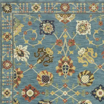 7' X 10' Blue Yellow And Ivory Oriental Area Rug With Fringe