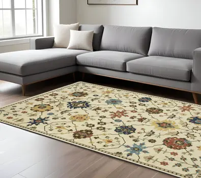 7' X 10' Ivory And Gold Oriental Area Rug With Fringe
