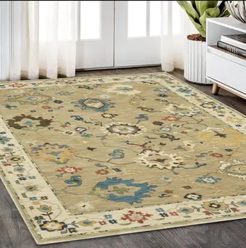 5' X 8' Beige Light Blue And Tan Oriental Area Rug With Fringe