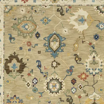 7' X 10' Beige Light Blue And Tan Oriental Area Rug With Fringe