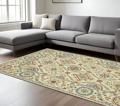 8' X 11' Ivory Blue And Orange Oriental Area Rug With Fringe