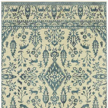 5' X 8' Ivory And Blue Oriental Area Rug With Fringe