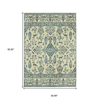 5' X 8' Ivory And Blue Oriental Area Rug With Fringe
