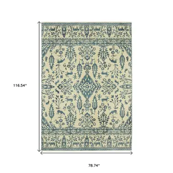 7' X 10' Ivory And Blue Oriental Area Rug With Fringe