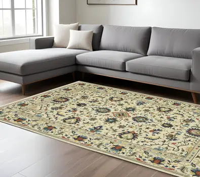 7' X 10' Ivory Blue And Orange Oriental Area Rug With Fringe