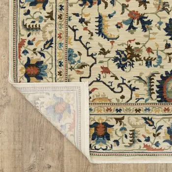 7' X 10' Ivory Blue And Orange Oriental Area Rug With Fringe