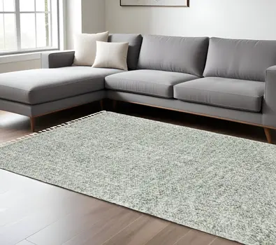 8' X 11' Light Blue And Ivory Abstract Shag Area Rug With Fringe