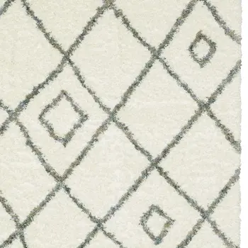 5' X 8' Ivory Gray And Tan Diamond Shag Area Rug With Fringe