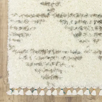 5' X 8' Ivory And Green Geometric Shag Area Rug With Fringe
