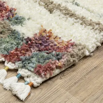 5' X 8' Tan Gray And Ivory Abstract Shag Distressed Area Rug With Fringe