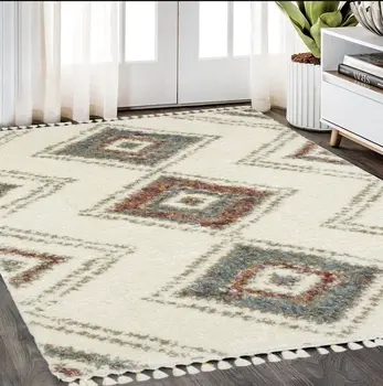 5' X 8' Ivory Red And Orange Southwestern Shag Area Rug With Fringe