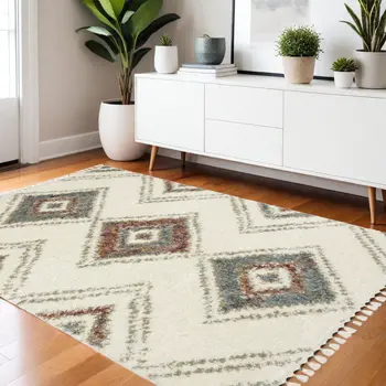 4' X 5' Ivory Red And Orange Southwestern Shag Area Rug With Fringe
