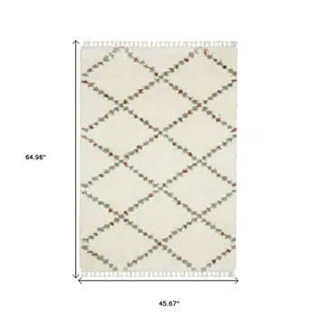 4' X 6' Ivory Tan And Gray Diamond Shag Area Rug With Fringe