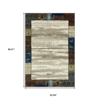 5' X 7' Ivory Tan And Blue Patchwork Area Rug